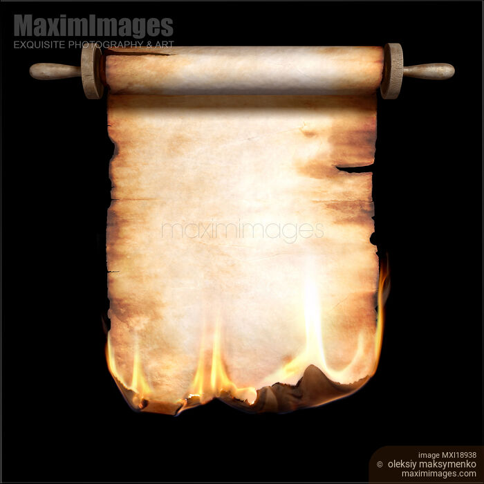 Image of Burning Vintage Roll of Parchment Conceptual Background