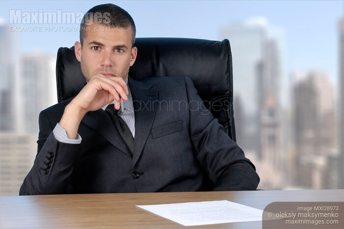 Stock photo of Businessman in his Office Buy commercial use license at MaximImages