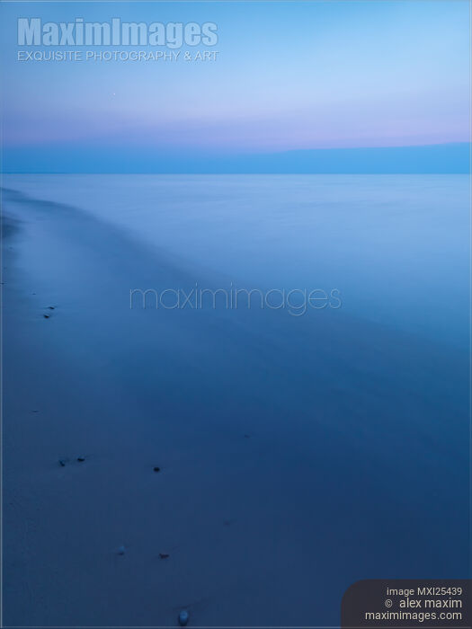 Stock photo of Calm lake Huron at dusk Buy commercial use license at MaximImages
