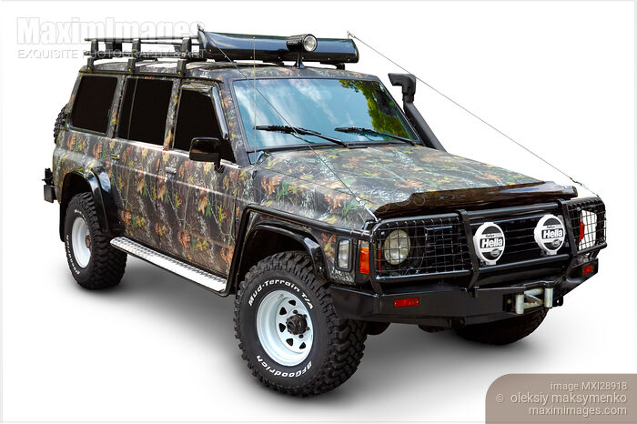 Stock photo of Camouflaged Nissan Patro Buy commercial use license at MaximImages