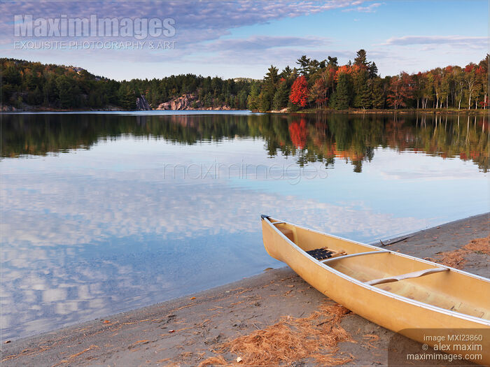 Canoe on a Shore Autumn Nature Scenery Stock photo of Canoe on a Shore Autumn Nature Scenery Buy commercial use license at MaximImages