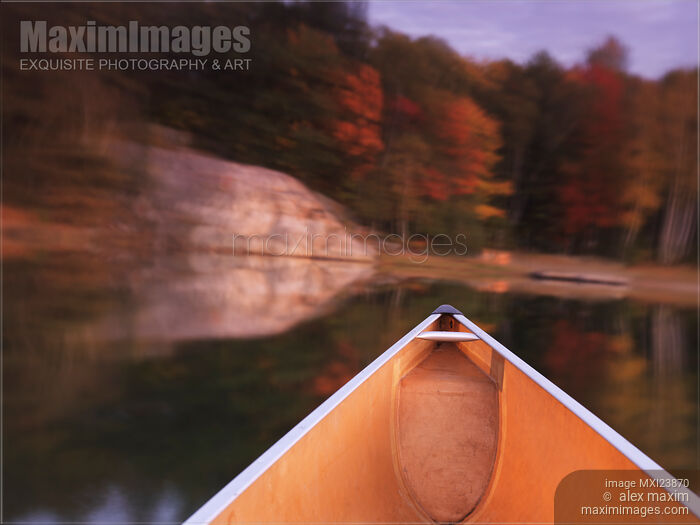 Stock photo of Canoeing in Fall Buy commercial use license at MaximImages