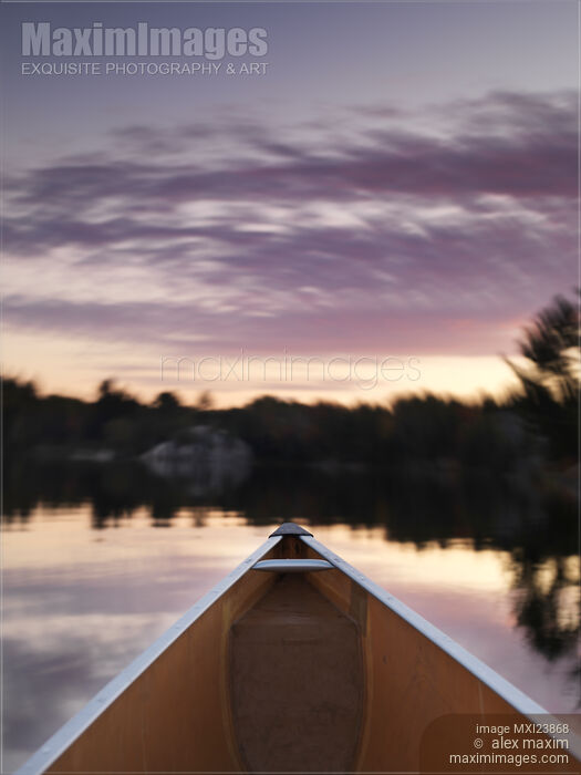 Stock photo of Canoeing in Twilight Buy commercial use license at MaximImages