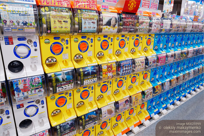 Stock photo of Capsule station machines with anime action figures Buy commercial use license at MaximImages