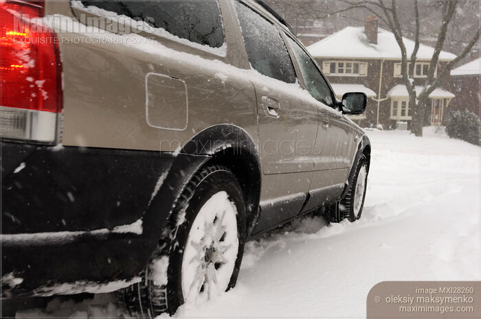 Stock photo of Car in Snow Buy commercial use license at MaximImages