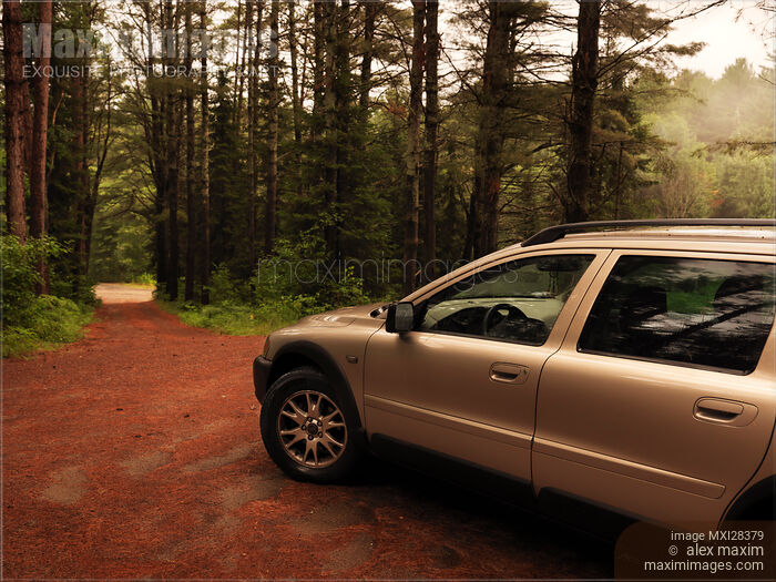 Stock photo of Car on unpaved road in the nature Buy commercial use license at MaximImages