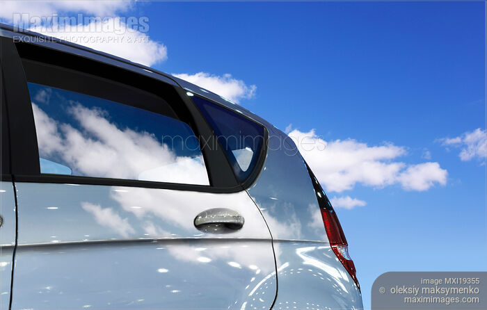Stock photo of Car Under Blue Sky Buy commercial use license at MaximImages