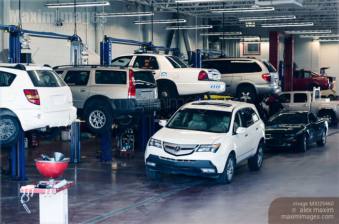 Stock photo of Cars in mechanic shop Auto service Buy commercial use license at MaximImages