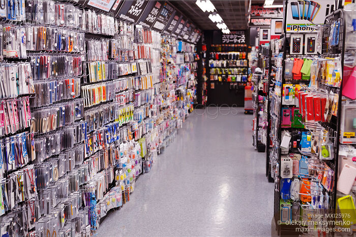 Cellphone accessories at electronics store Stock photo of Cellphone accessories at electronics store Buy commercial use license at MaximImages