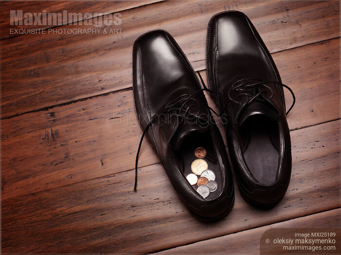 Stock photo of Change found in shoes Buy commercial use license at MaximImages