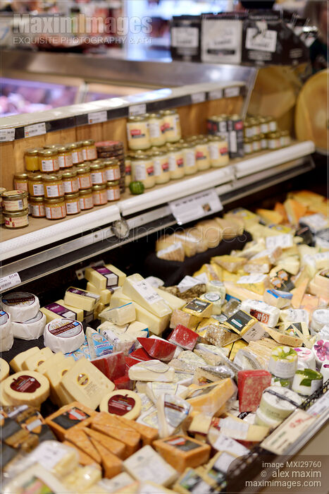 Cheeses at a farmer's market grocery store Stock photo of Cheeses at a farmer's market grocery store Buy commercial use license at MaximImages
