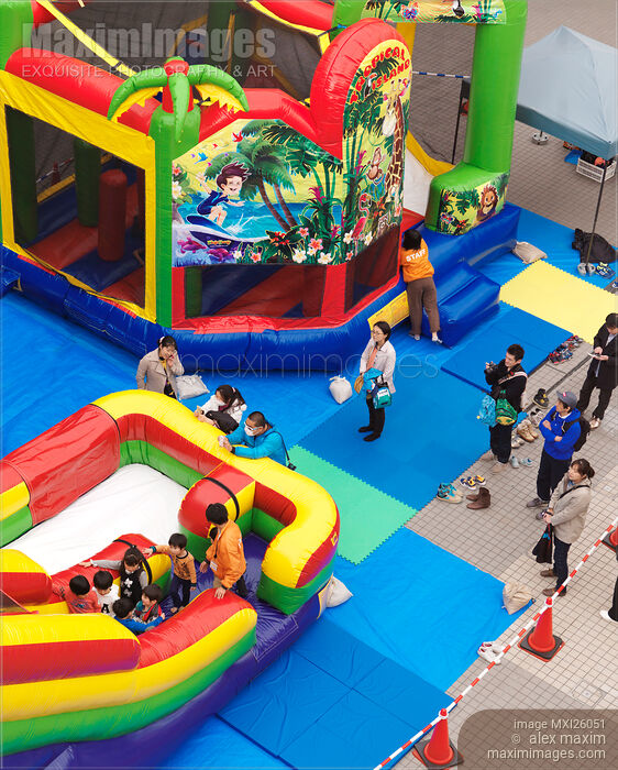 Stock photo of Children playground with inflatable rides in Japan Buy commercial use license at MaximImages