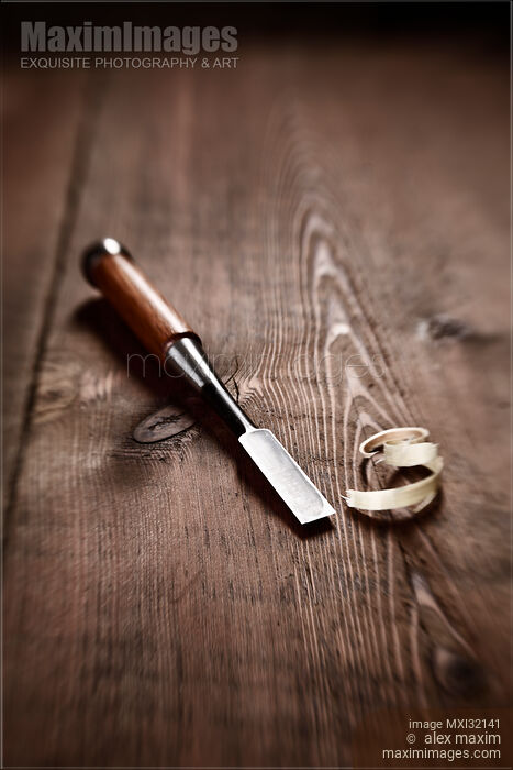 Stock photo of Chisel and wood shavings Carpentry still life Buy commercial use license at MaximImages