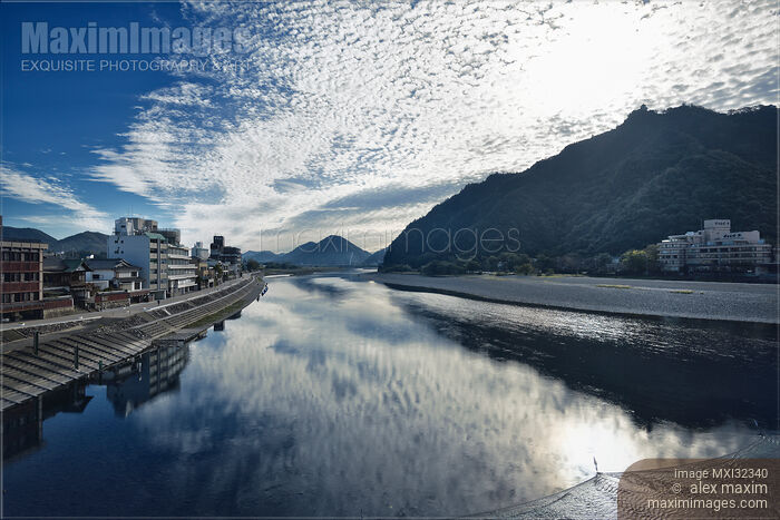 City of Gifu sunrise scenery of buildings along the Nagara River and Gifu Castle on Mount Kinka Stock photo of City of Gifu sunrise scenery of buildings along the Nagara River and Gifu Castle on Mount Kinka Buy commercial use license at MaximImages