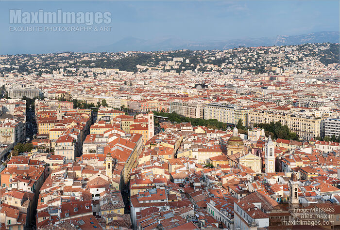 Stock photo of City of Nice, France aerial landscape scenery of old city historic architecture and clay tile rooftops Buy commercial use license at MaximImages