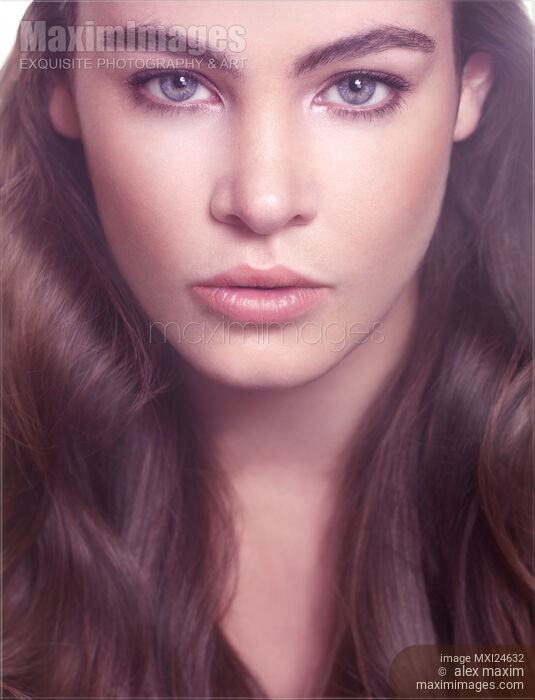 Closeup beauty face portrait of young woman Stock photo of Closeup beauty face portrait of young woman Buy commercial use license at MaximImages