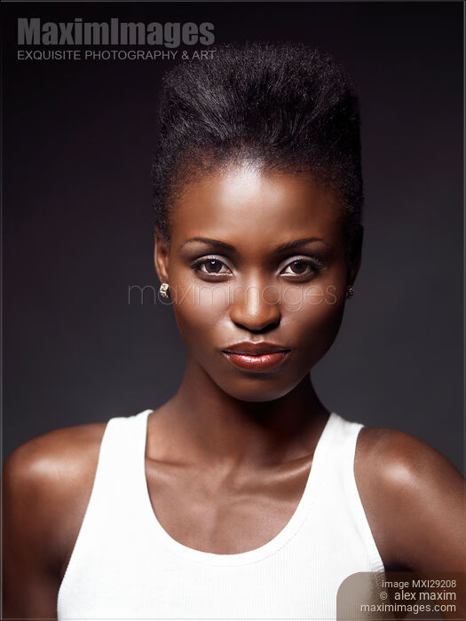 Closeup beauty portrait of a young black african american woman with edgy hairstyle Stock photo of Closeup beauty portrait of a young black african american woman with edgy hairstyle Buy commercial use license at MaximImages