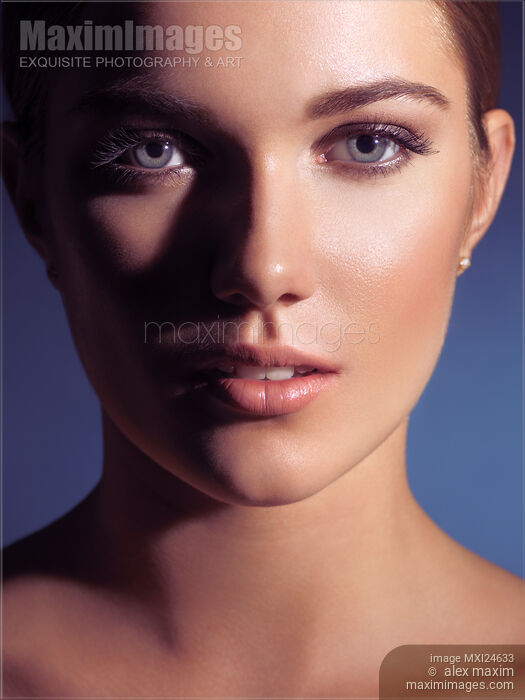 Closeup beauty portrait of a young woman face Stock photo of Closeup beauty portrait of a young woman face Buy commercial use license at MaximImages