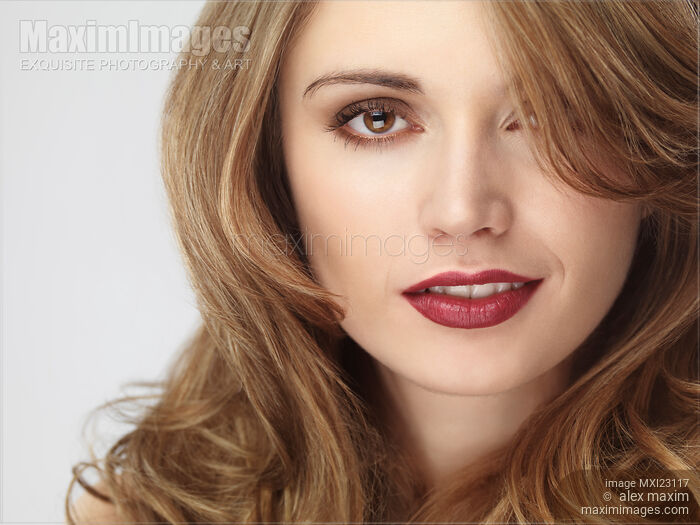 Closeup of a Beautiful young woman face Stock photo of Closeup of a Beautiful young woman face Buy commercial use license at MaximImages