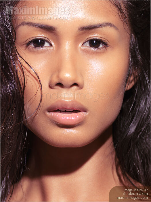 Stock photo of Closeup of a beautiful young woman face Buy commercial use license at MaximImages