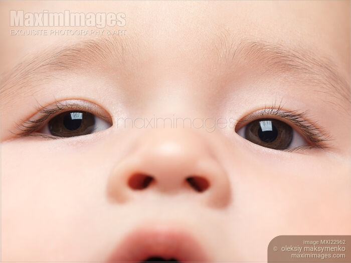 Stock photo of Closeup of Baby's Eyes Buy commercial use license at MaximImages