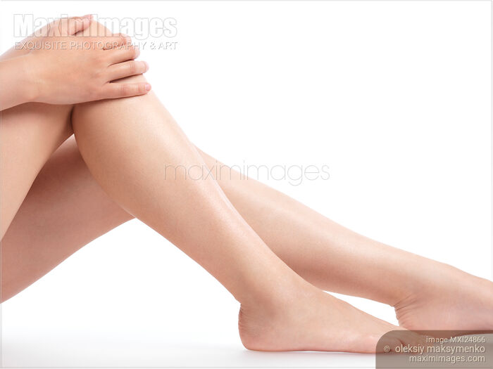 Closeup of Bare Woman Legs and Feet Stock photo of Closeup of Bare Woman Legs and Feet Buy commercial use license at MaximImages