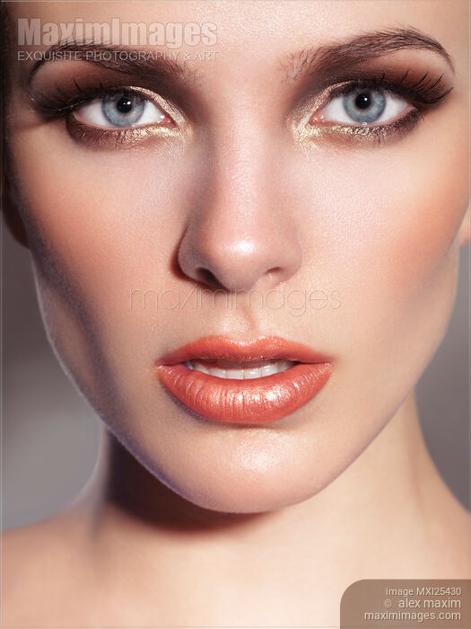 Stock photo of Closeup of Beautiful Woman Face Buy commercial use license at MaximImages