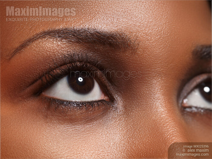Stock photo of Closeup of black woman eyes Buy commercial use license at MaximImages