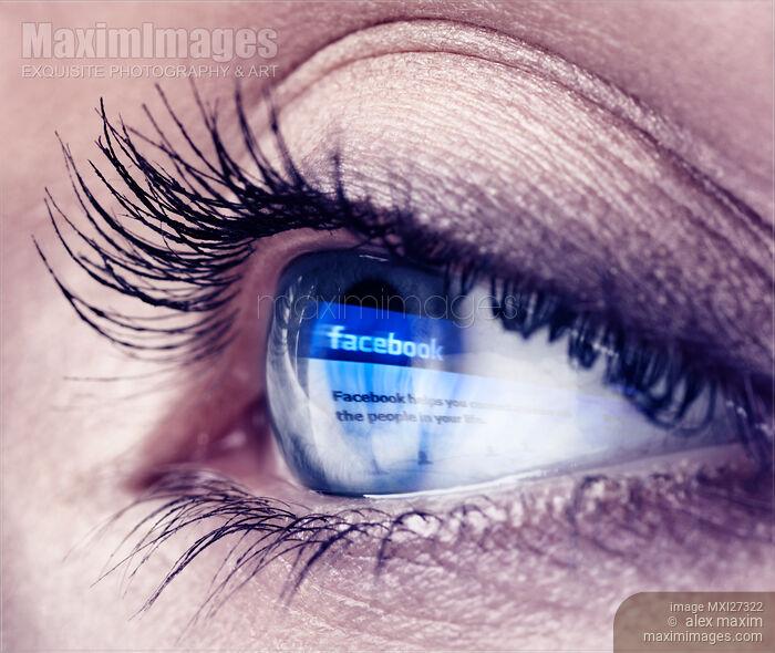 Stock photo of Closeup of eye with Facebook logo reflecting in it Buy commercial use license at MaximImages
