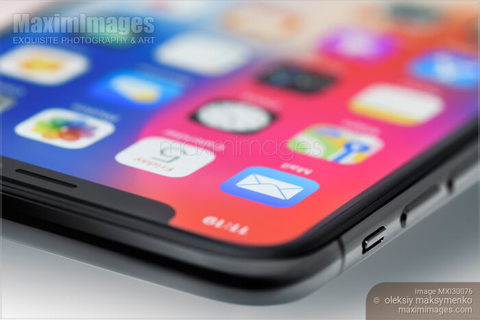 Closeup of iPhone X corner of display focused on mail app Stock photo of Closeup of iPhone X corner of display focused on mail app Buy commercial use license at MaximImages