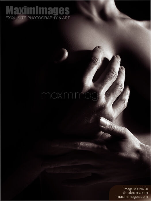 Closeup of man hand on nude woman breast Stock photo of Closeup of man hand on nude woman breast Buy commercial use license at MaximImages