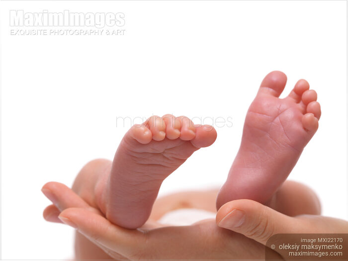 Stock photo of Closeup of Newborn Baby Feet Buy commercial use license at MaximImages
