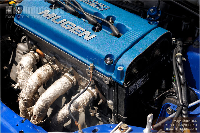 Closeup of Racing Car Engine Stock photo of Closeup of Racing Car Engine Buy commercial use license at MaximImages
