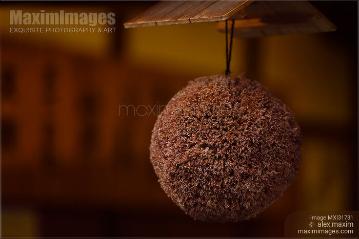 Closeup of Sugidama cedar ball hanging at a sake brewery in Japan Stock photo of Closeup of Sugidama cedar ball hanging at a sake brewery in Japan Buy commercial use license at MaximImages