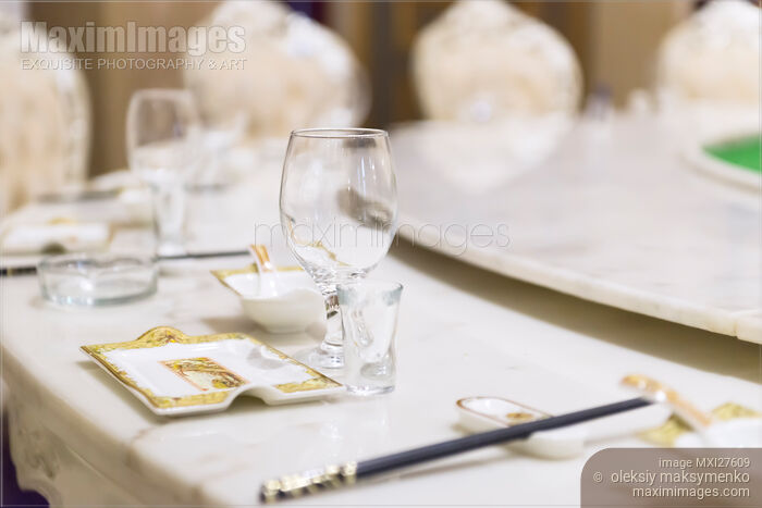 Closeup of tableware on table in China Stock photo of Closeup of tableware on table in China Buy commercial use license at MaximImages