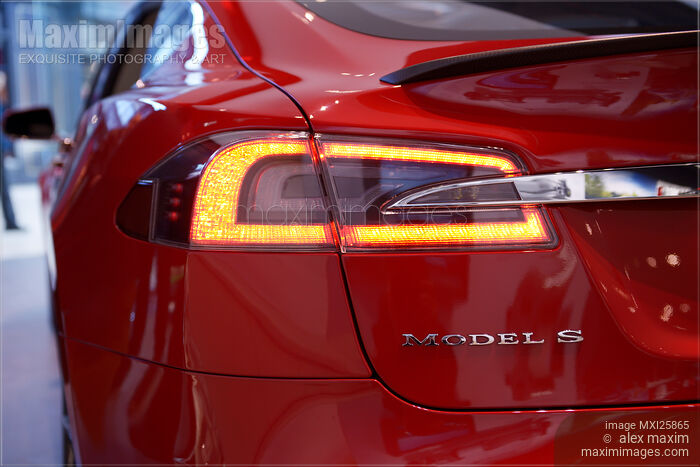 Stock photo of Closeup of Tesla Model S electric car Buy commercial use license at MaximImages
