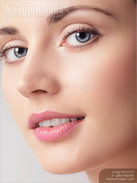 Closeup of young beautiful face with blue eyes Stock photo of Closeup of young beautiful face with blue eyes Buy commercial use license at MaximImages