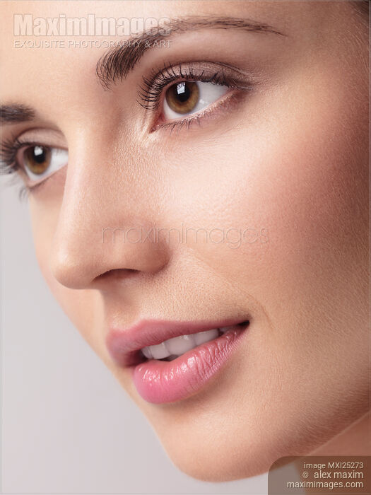 Stock photo of Closeup of young beautiful face with clean look Buy commercial use license at MaximImages