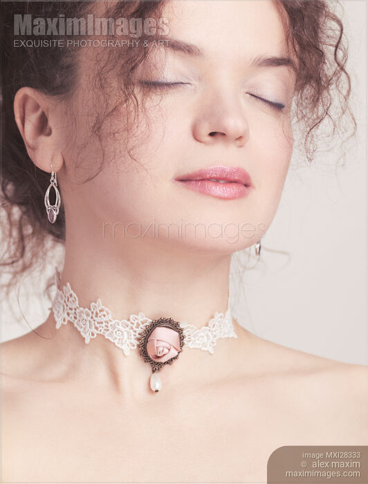 Closeup of young beautiful woman face Stock photo of Closeup of young beautiful woman face Buy commercial use license at MaximImages