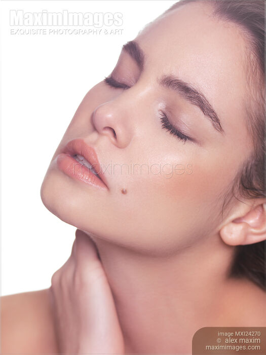 Closeup of young woman face Stock photo of Closeup of young woman face Buy commercial use license at MaximImages