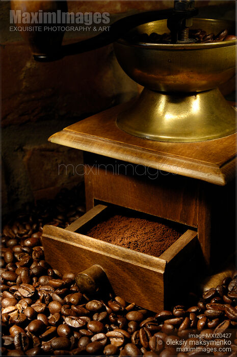 Coffee Beans and an Old Coffee Grinder Stock photo of Coffee Beans and an Old Coffee Grinder Buy commercial use license at MaximImages