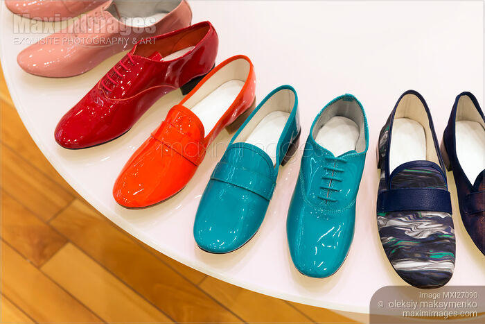 Colorful shoes on store display Stock photo of Colorful shoes on store display Buy commercial use license at MaximImages