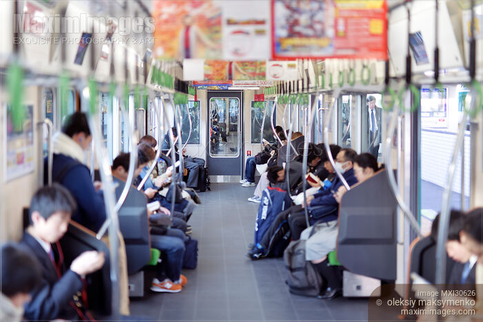 Commuting people inside JR train in Japan Stock photo of Commuting people inside JR train in Japan Buy commercial use license at MaximImages