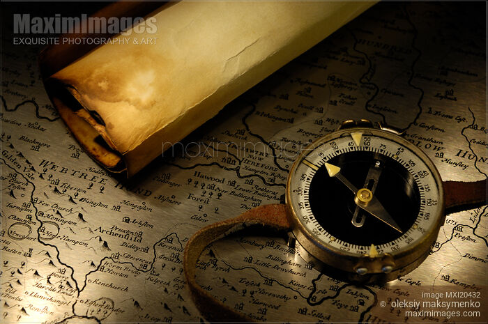 Stock photo of Compass and a Map Buy commercial use license at MaximImages