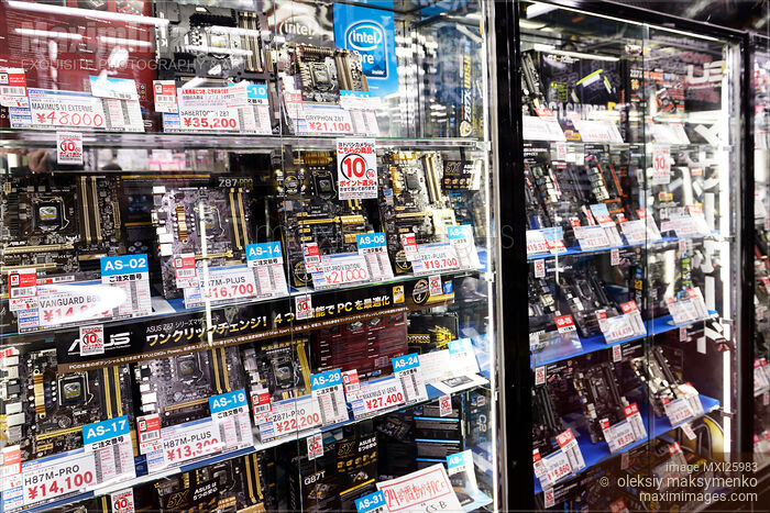 Stock photo of Computer motherboards on display in store Buy commercial use license at MaximImages
