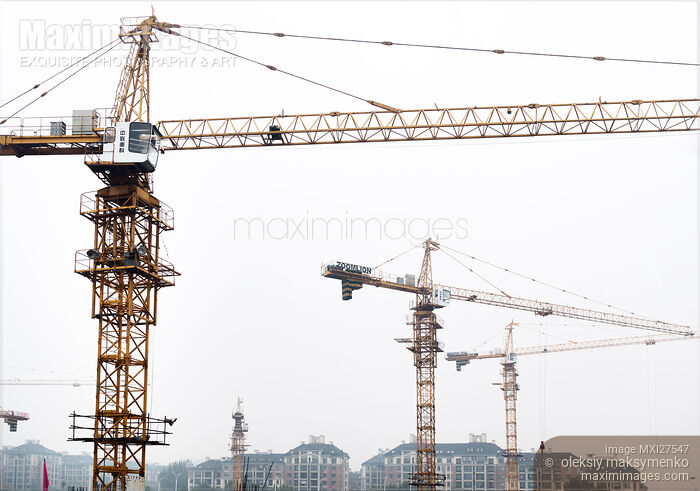 Stock photo of Construction cranes in Zhengzhou China Buy commercial use license at MaximImages