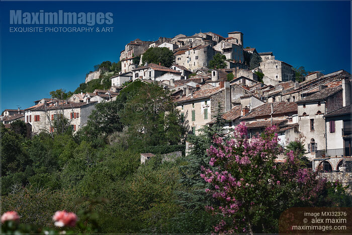 Cordes-sur-Ciel medieval town medieval architecture on top of a hill South of France Stock photo of Cordes-sur-Ciel medieval town medieval architecture on top of a hill South of France Buy commercial use license at MaximImages