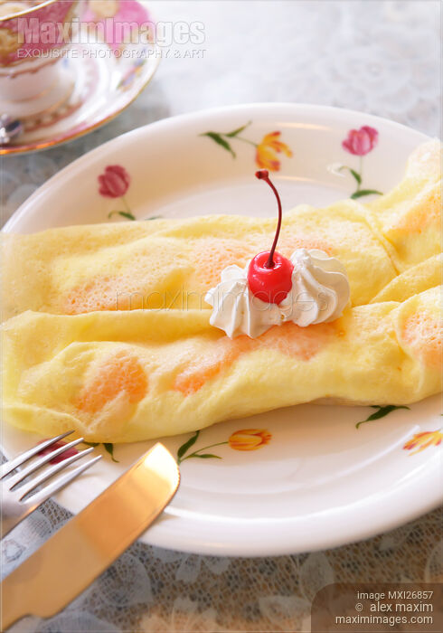 Stock photo of Crepes on a plate Buy commercial use license at MaximImages