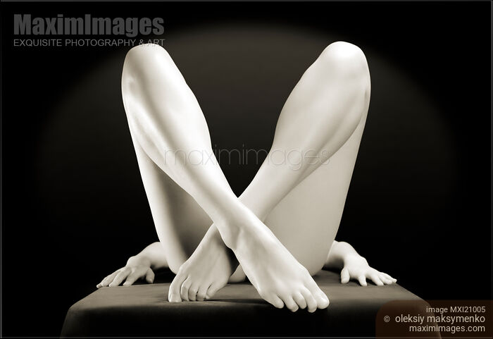 Stock photo of Crossed Legs Buy commercial use license at MaximImages