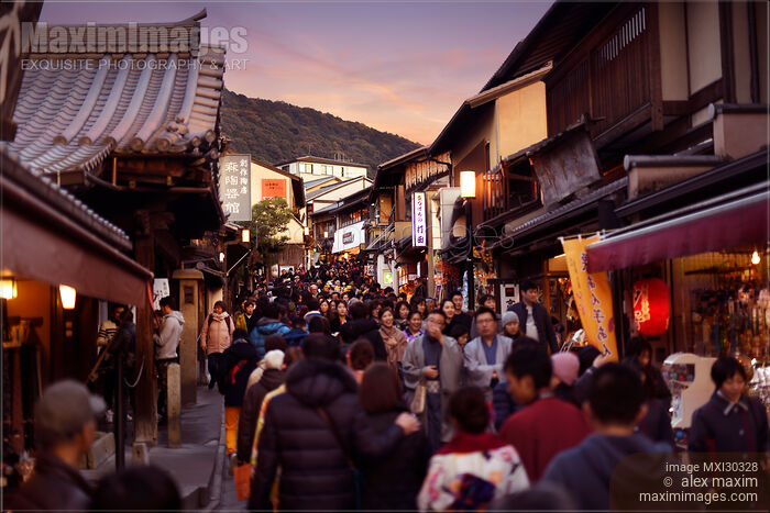 Stock photo of Crowded with people Matsubara dori street during sunset in Kyoto Japan Buy commercial use license at MaximImages